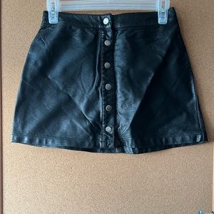 Leather mini skirt.